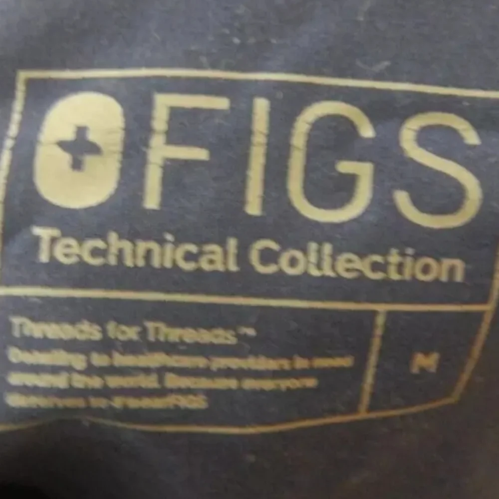 Figs pants fading